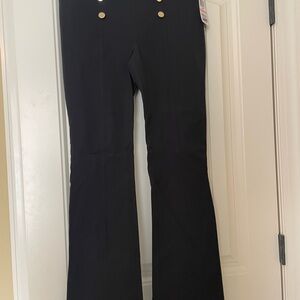 INC  Black Flared Pants with Gold decorative buttons in front.